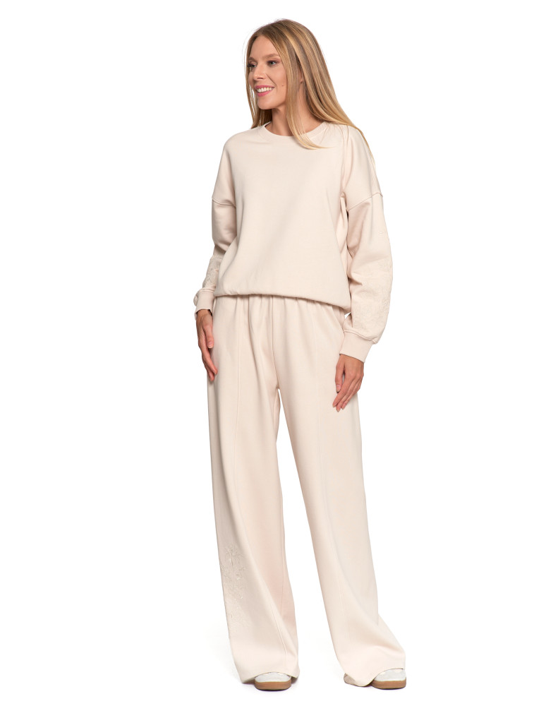 Bluzy - Bluza dresowa damska ocieplana luźna z haftowanymi rękawami KREMOWY - produkt moraj.pl 2